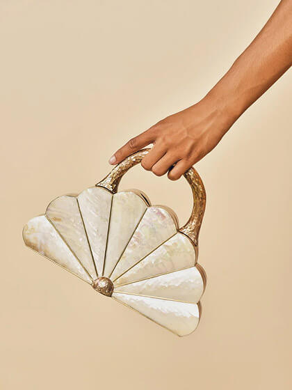 Shell clutch with gold handle