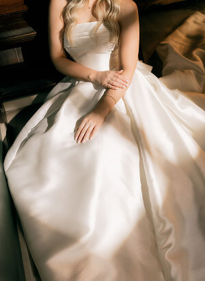 Model wearing a white dress
